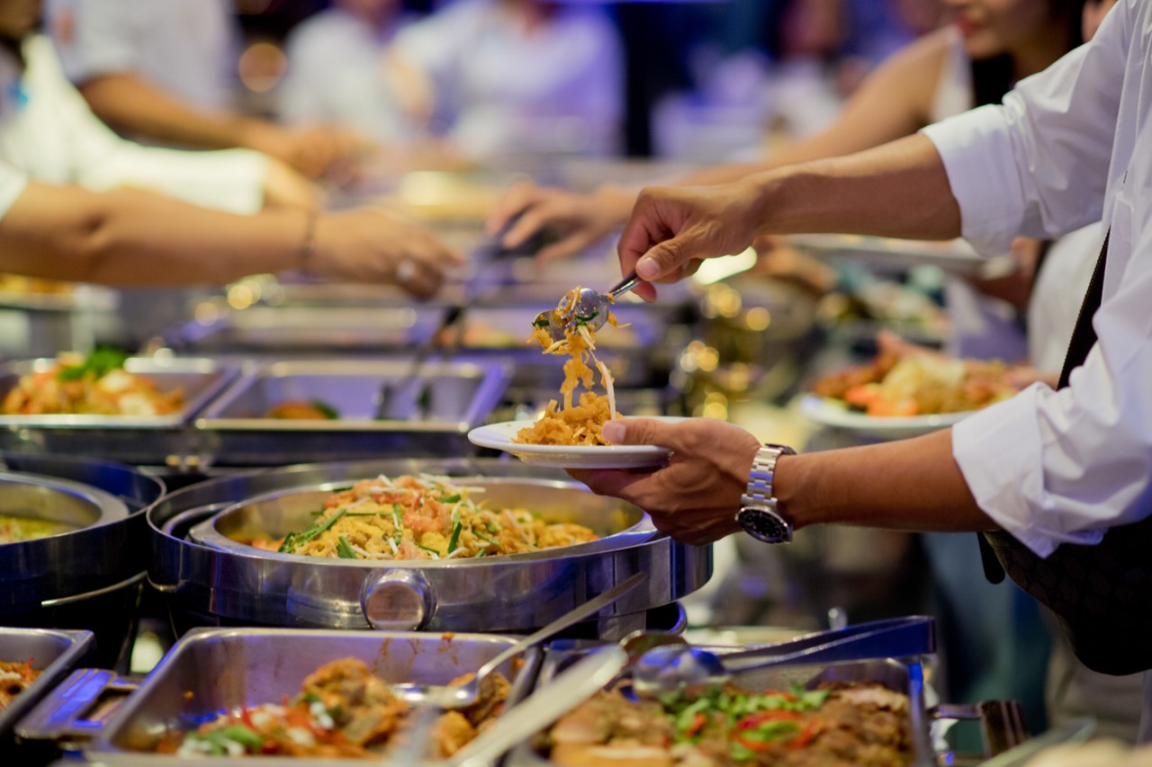 scooping-the-food.-buffet-food-at-restaurant.-catering-food