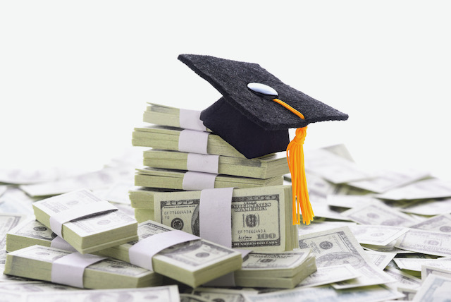 mortarboard-on-a-pile-of-money-representing-the-high-cost-of-higher-education-and-bribery