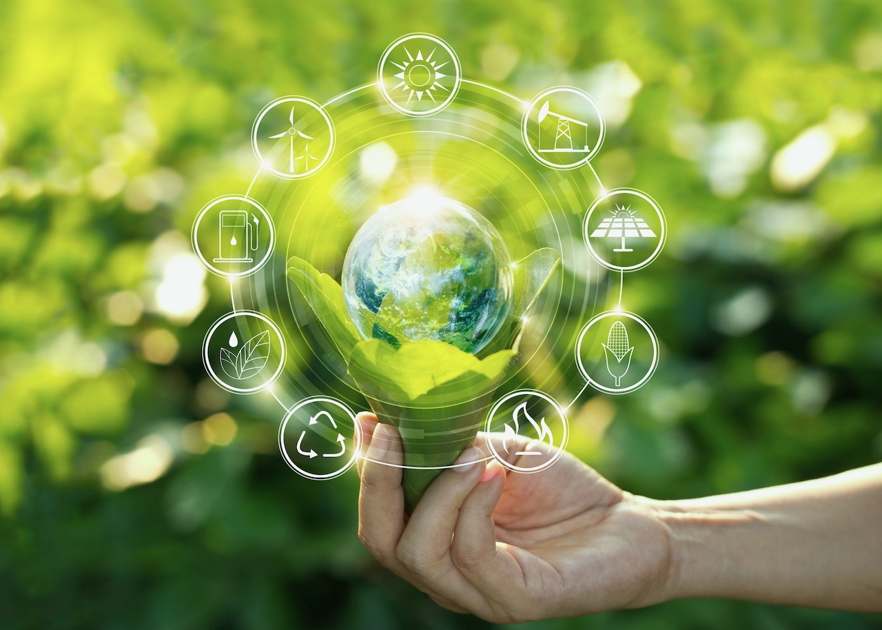 hand-holding-light-bulb-against-nature-on-green-leaf-with-icons-energy-sources-for-renewable--sustainable-development.-ecology-concept.-elements-of-this-image-furnished-by-nasa